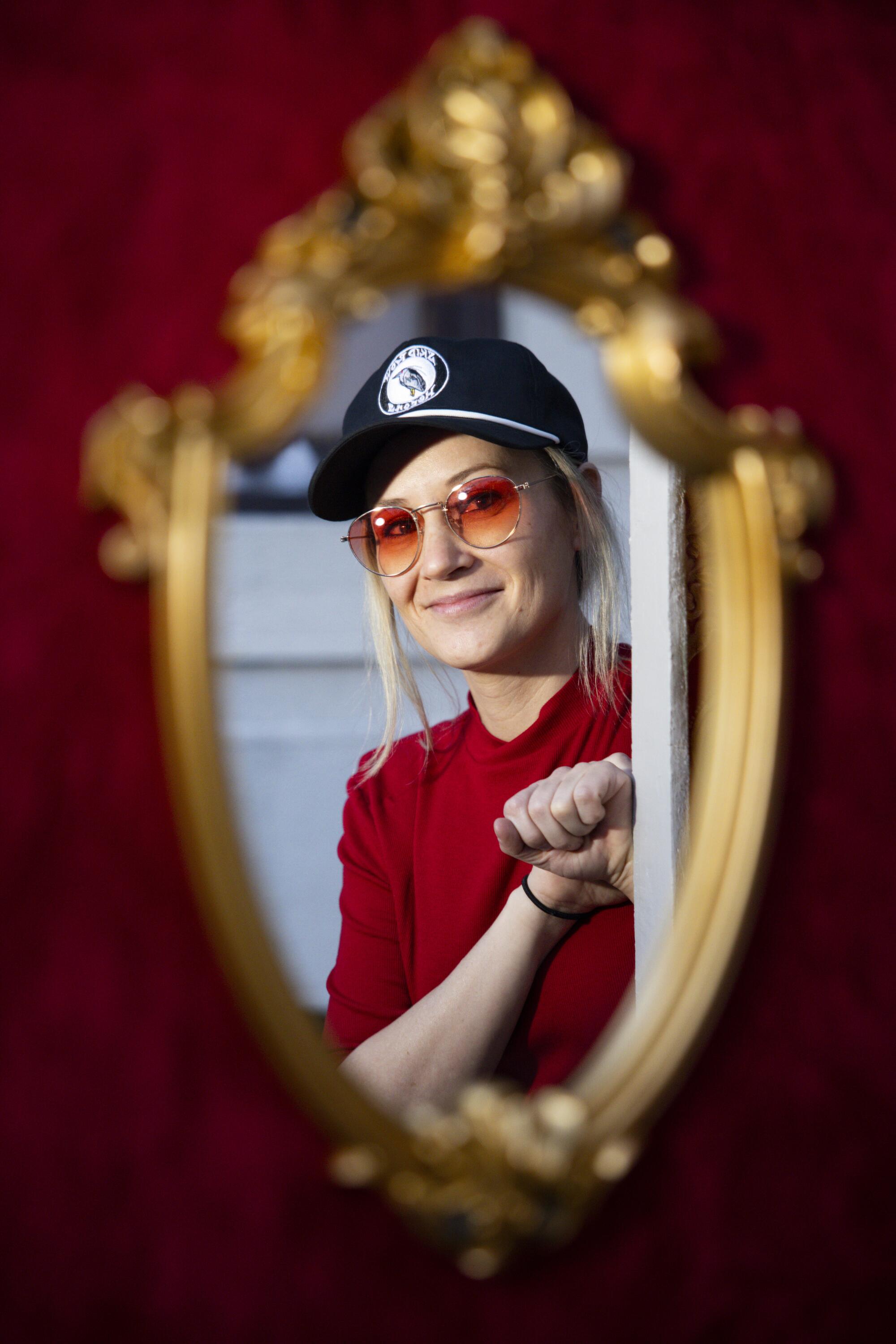 Artist, S.C. Mero poses for a portrait in her newest art project, "Electrical Box Theatre"