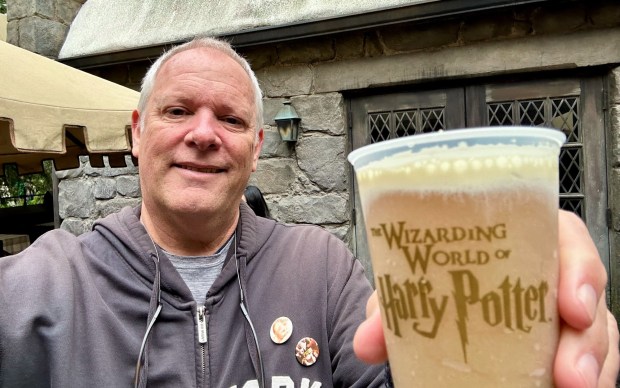 Theme Park Reporter Brady MacDonald raises a Butterbeer in Wizarding World of Harry Potter at Universal Studios Hollywood. (Brady MacDonald/Orange County Register/SCNG)