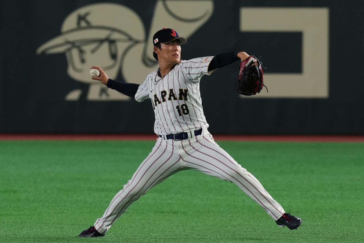 Dodgers pitcher Yoshinobu Yamamoto practices in Tokyo on Wednesday ahead of Japan's WBC opener.