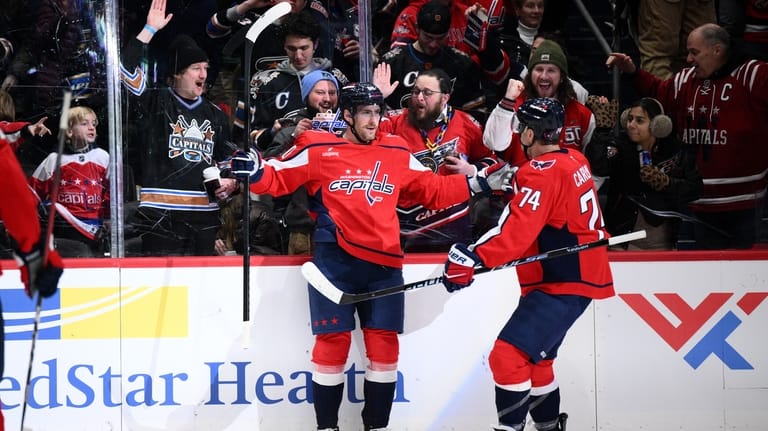 Washington Capitals left wing Pierre-Luc Dubois (80) celebrates his goal...