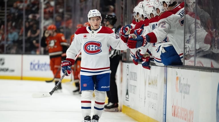 Montreal Canadiens defenseman Lane Hutson celebrates his goal with the...