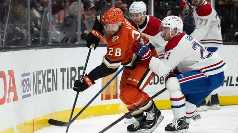 Anaheim Ducks left wing Jeffrey Viel (28) controls the puck...