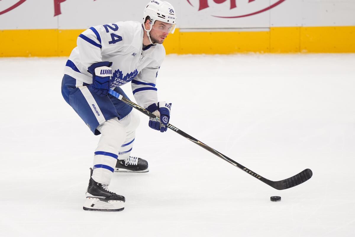 Toronto Maple Leafs center Scott Laughton skates with the puck during a game against the Dallas Stars in December.