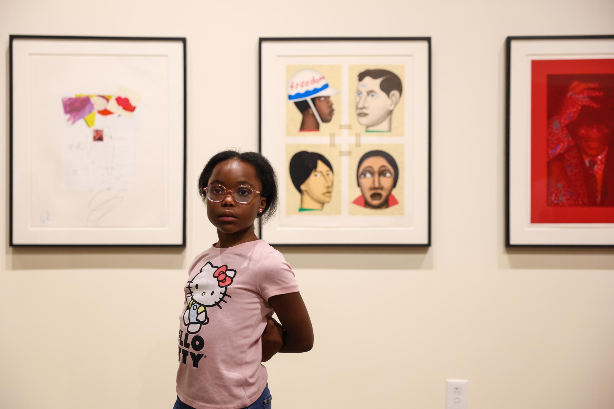Honey Cooper views an art exhibit at the Gresham Art Gallery