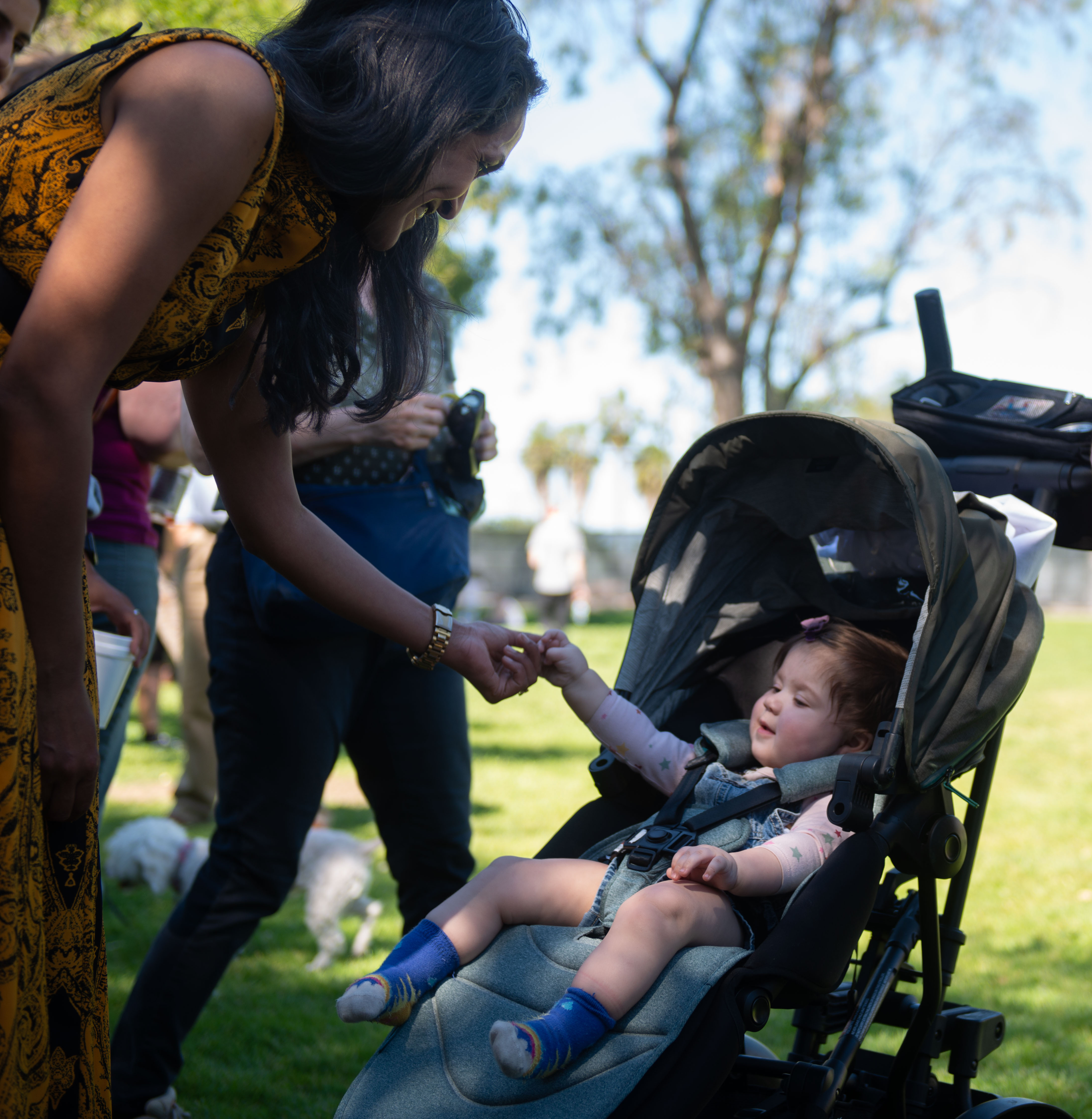 City Councilwoman Nithya Raman greets Miriam Avalos before the start...