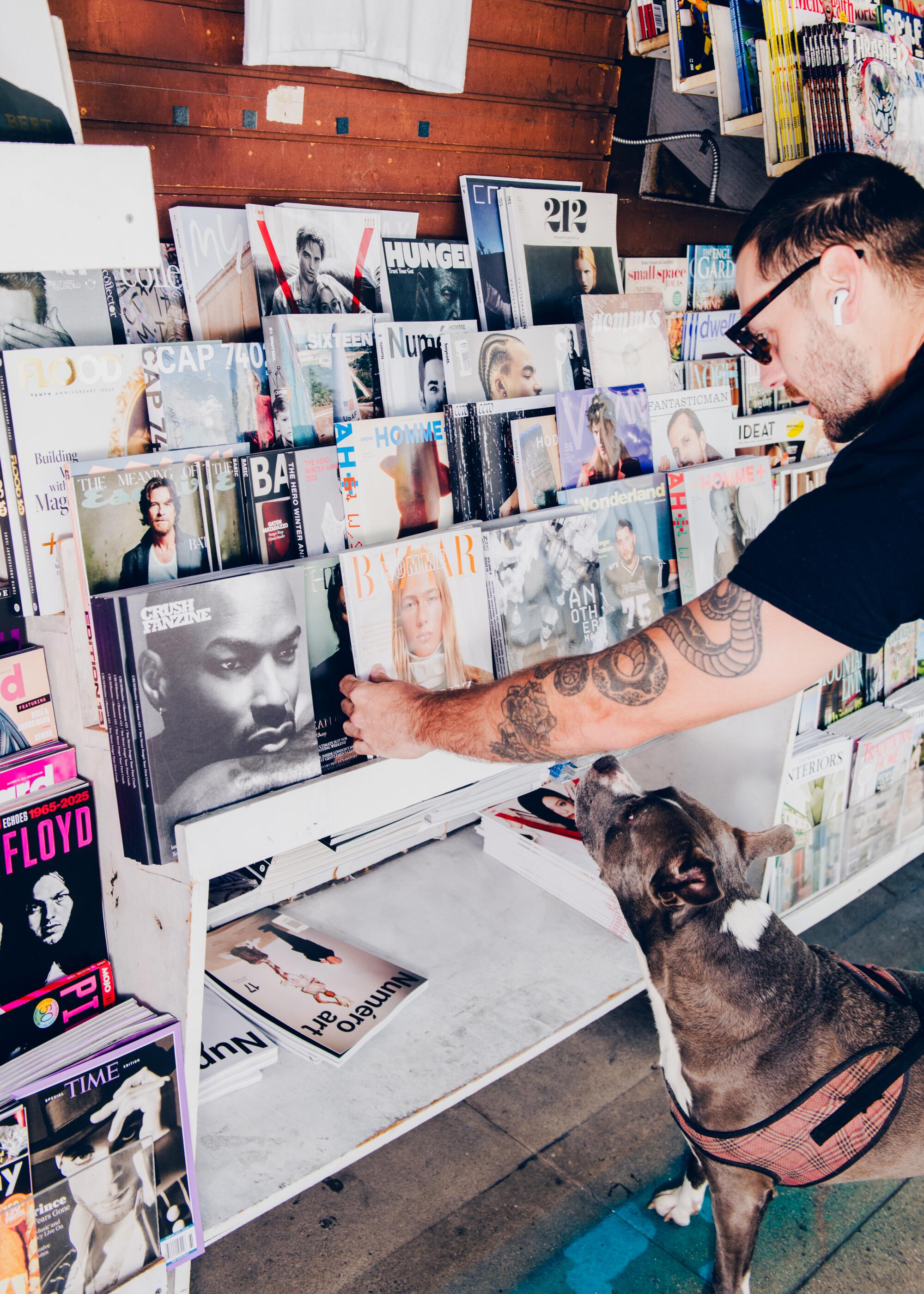 Regular customer, Matt, looks at magazines.