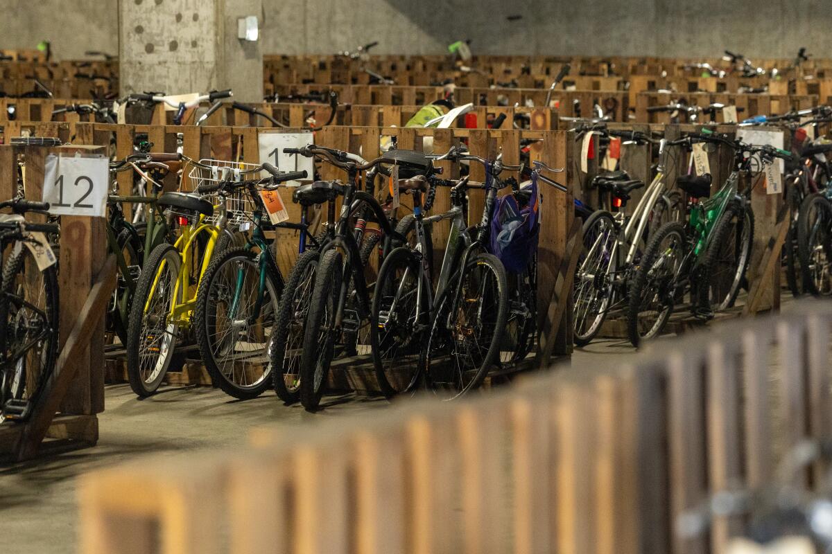 Numbered rows of bikes in storage