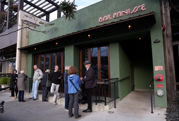 Patrons line up as they wait for Bar Panisse to open on Shattuck Avenue in Berkeley, Calif., on Monday, Feb. 23, 2026. The restaurant is the latest project from Alice Waters, the California chef who helped start the slow food farm-to-table movement. (Jane Tyska/Bay Area News Group)