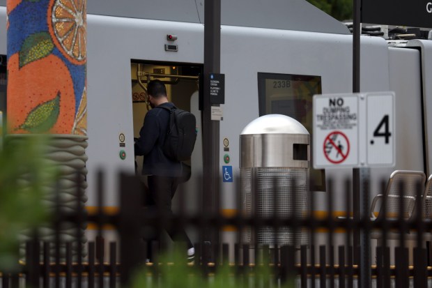 A Metro A Line rider boards the light-rail at the Glendora Station in Glendora on Tuesday, March 10, 2026. (Photo by Trevor Stamp, Contributing Photographer)