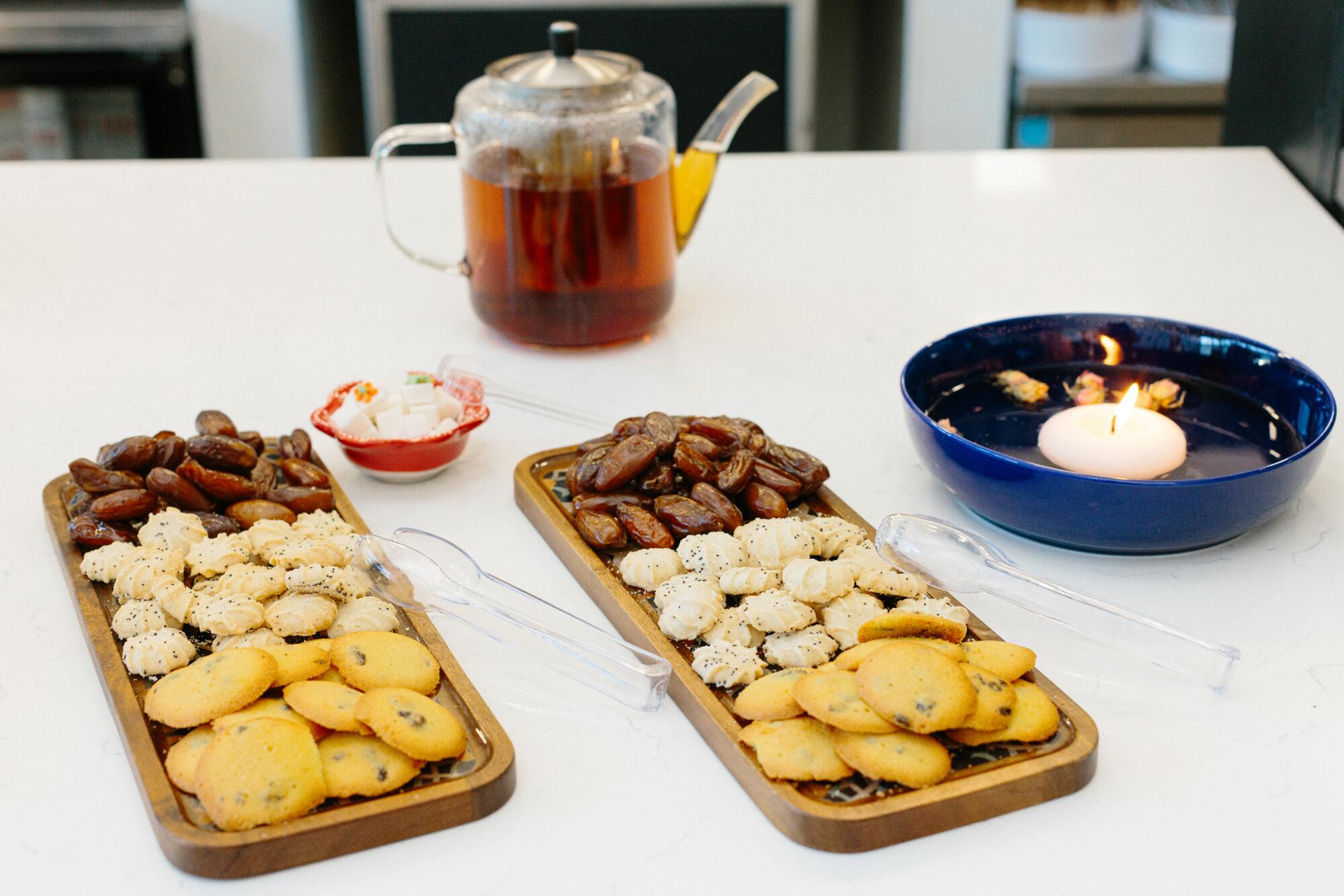 Pitted dates, rice cookies, raisin cookies and tea are offered for free at Meymuni Cafe every weekend.