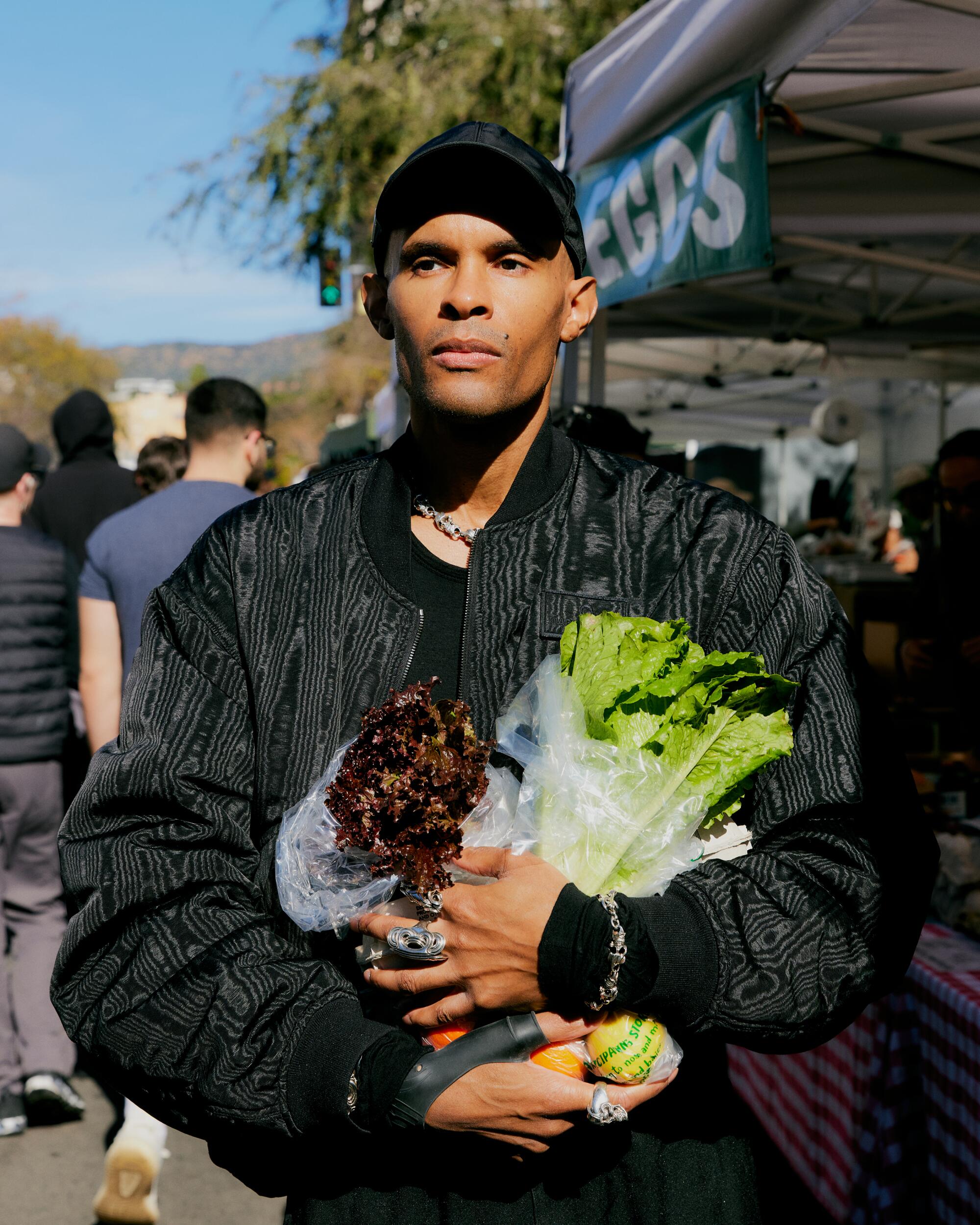 Quincy Vadan wears his personal jewelry designs, under the brand Vadan.