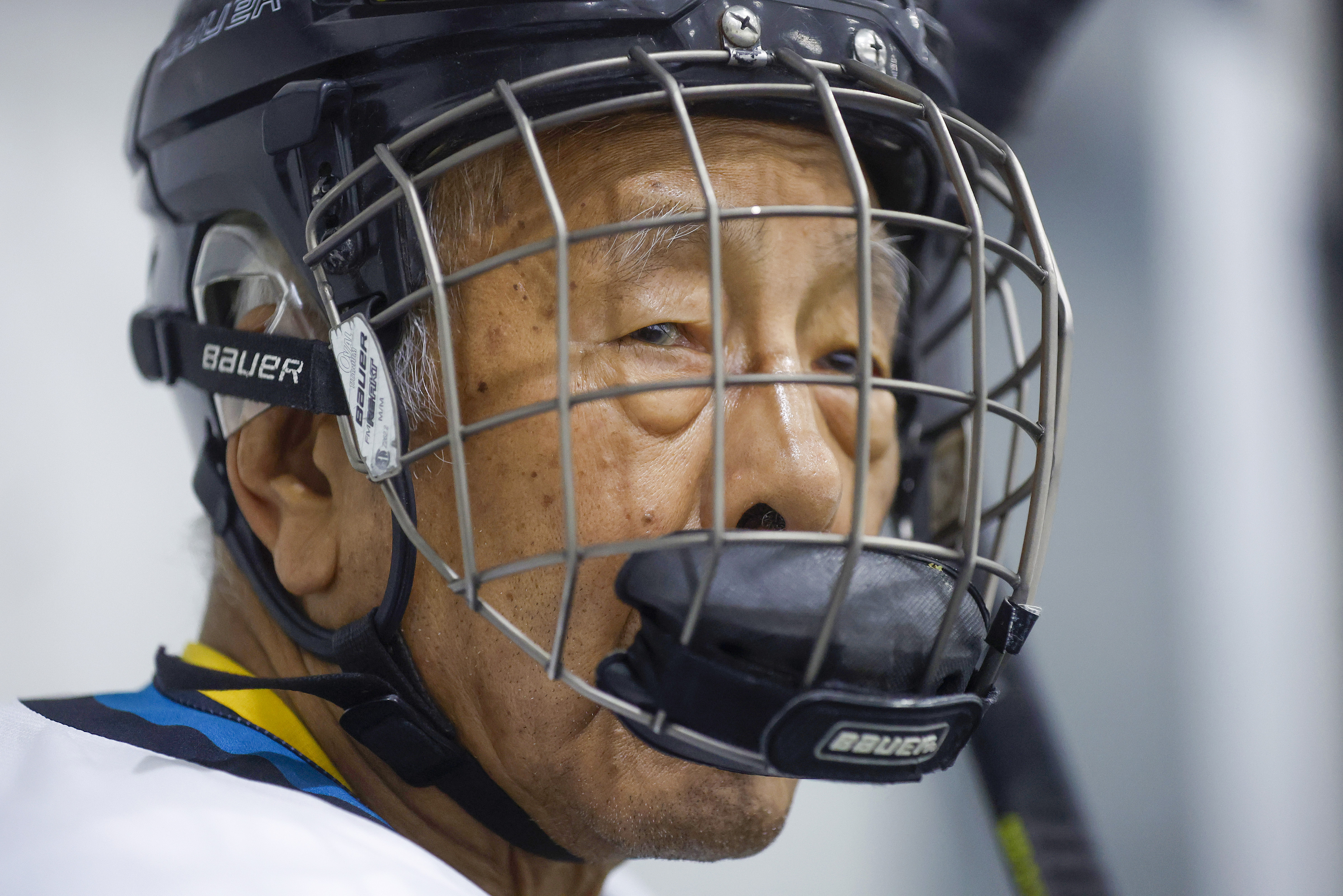 Ed Asato (3), 87, from Sunnyvale, waits on the bench...