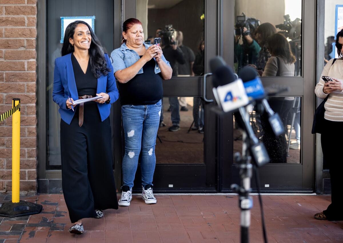 Los Angeles Councilmember Nithya Raman meets with reporters after filing paperwork to run for mayor.