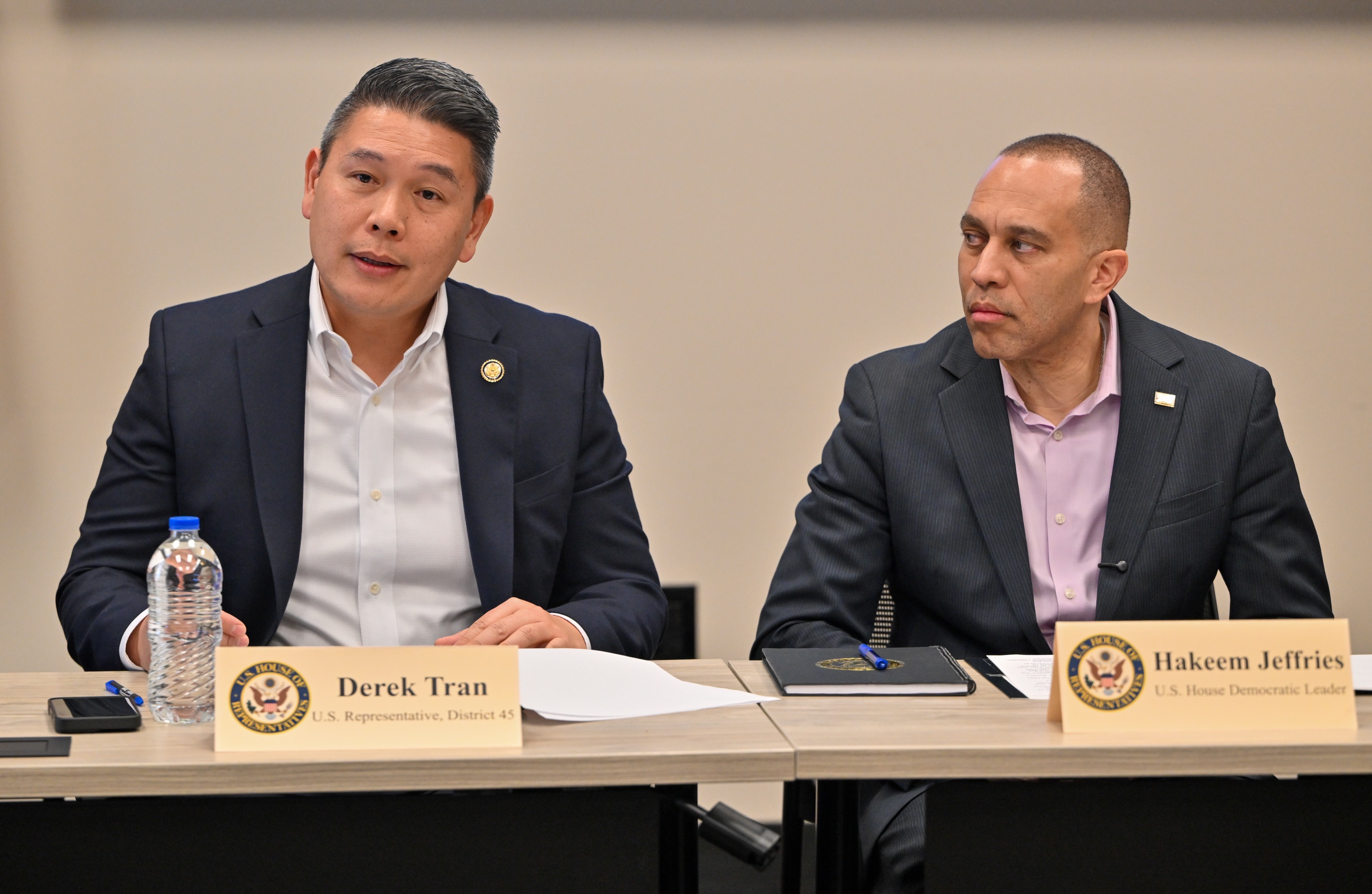 Derek Tran, D-Orange, left, and House Minority Leader Hakeem Jeffries,...