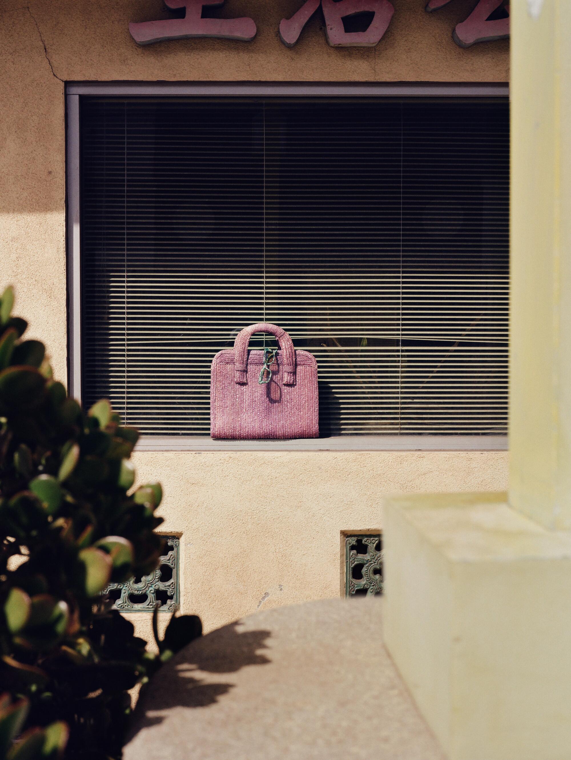 Photographer’s own sunglasses and vintage woven bag.