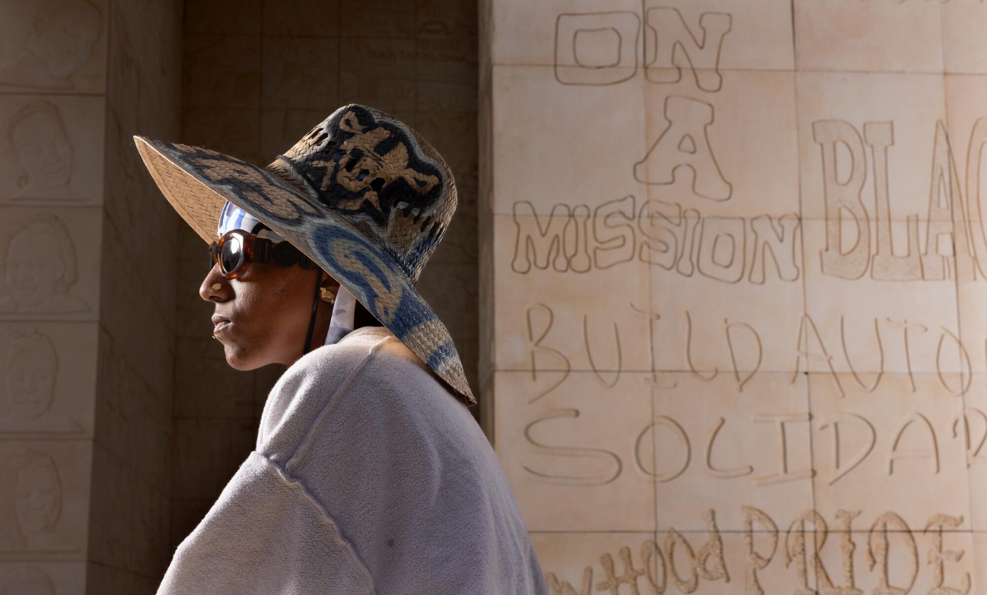 A woman in sunglasses.