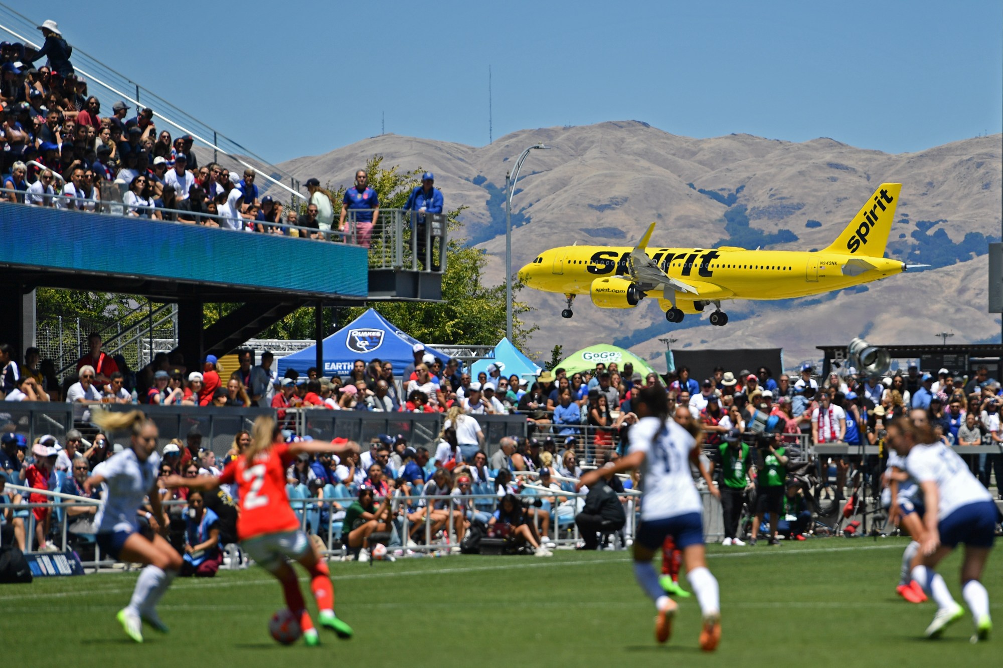 A Spirit Airlines plane lands at San Jose Mineta International Airport as the United States plays Wales during the first half of a FIFA Women's World Cup send-off match at PayPal Park in San Jose on July 9, 2023. The United States defeated Wales 2-0. (Jose Carlos Fajardo/Bay Area News Group)