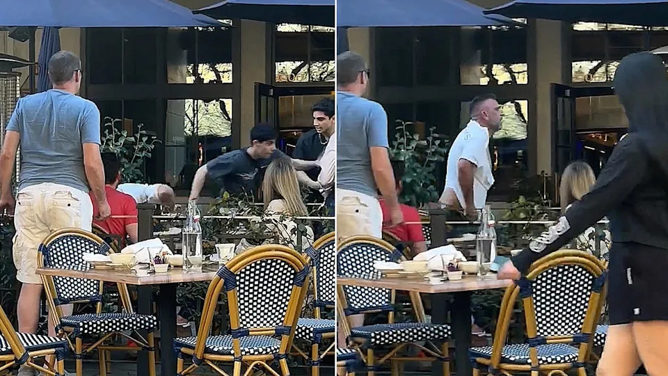 two men attack a victim before fleeing