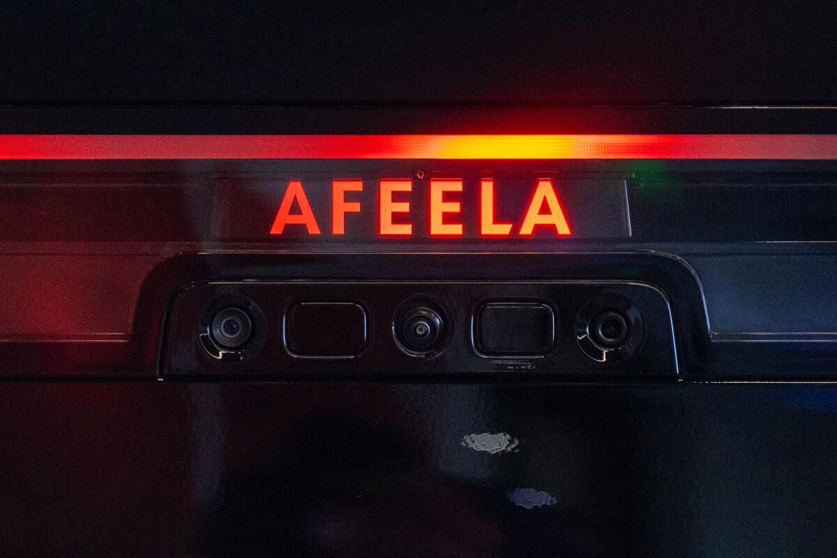 The AFEELA logo sits on top of a rear cameras