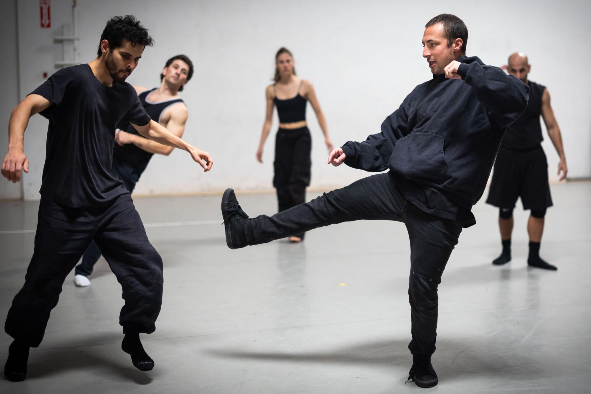 Two dancers working together.