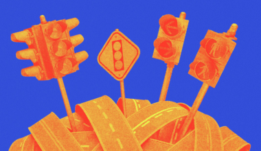 Four traffic lights and one traffic sign with a traffic light symbol emerge from a tangled pile of roads against a blue background.