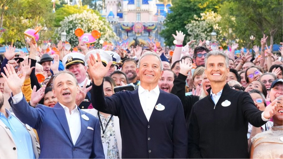 Disneyland Resort President Thomas Mazloum (left), Disney CEO Bob Iger...