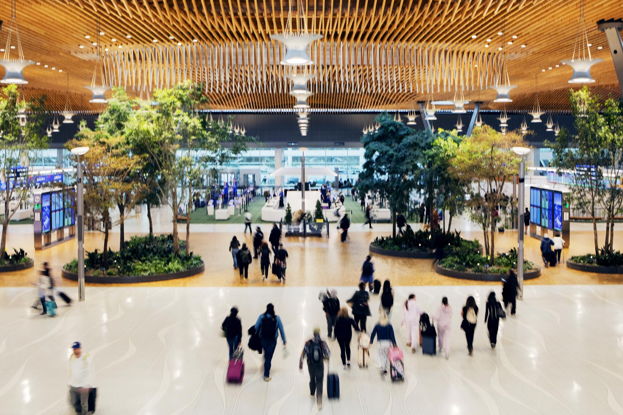 Travelers at Portland International Airport in Oregon 