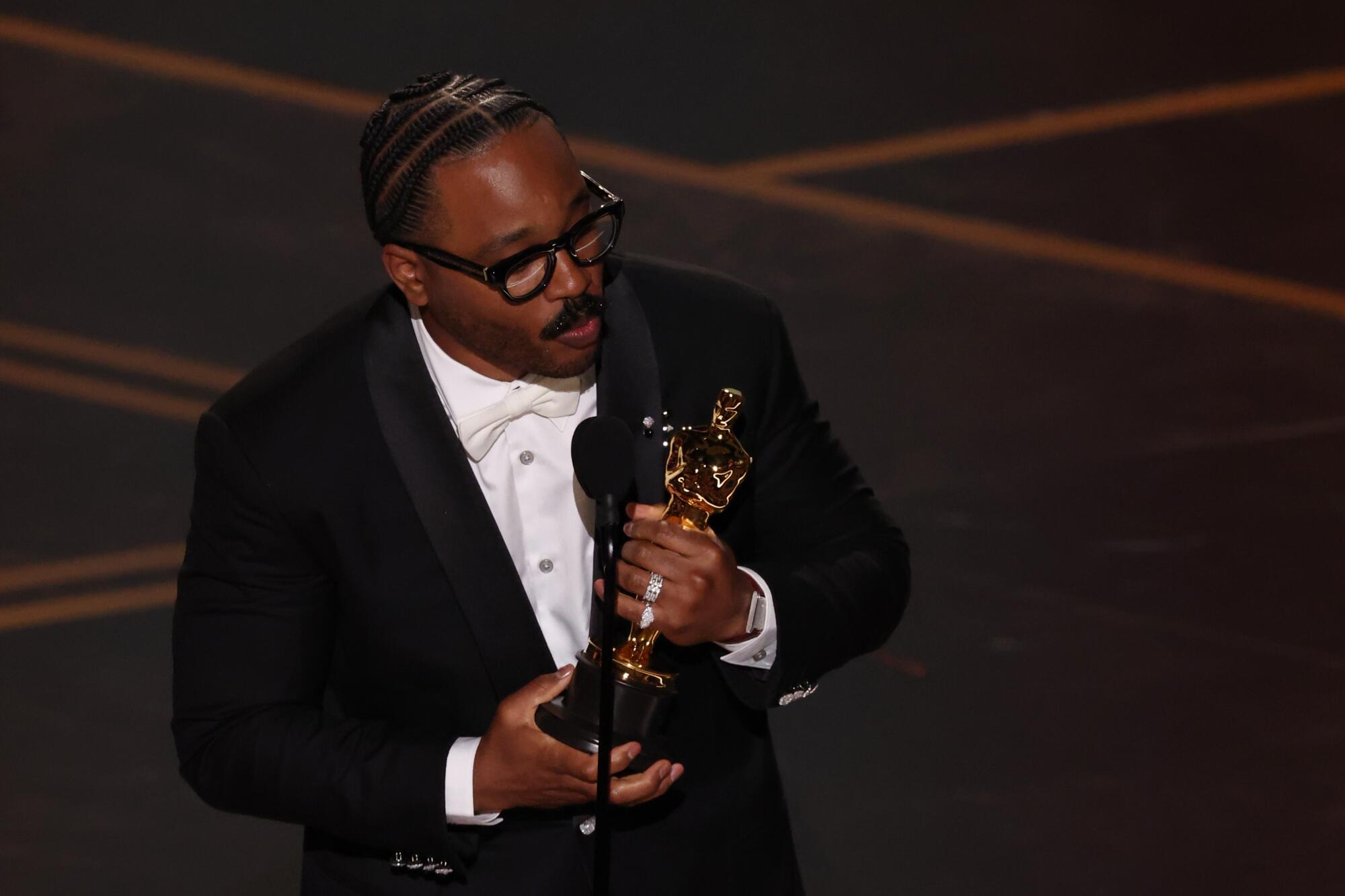 Ryan Coogler wins the Oscar for original screenplay for "Sinners."