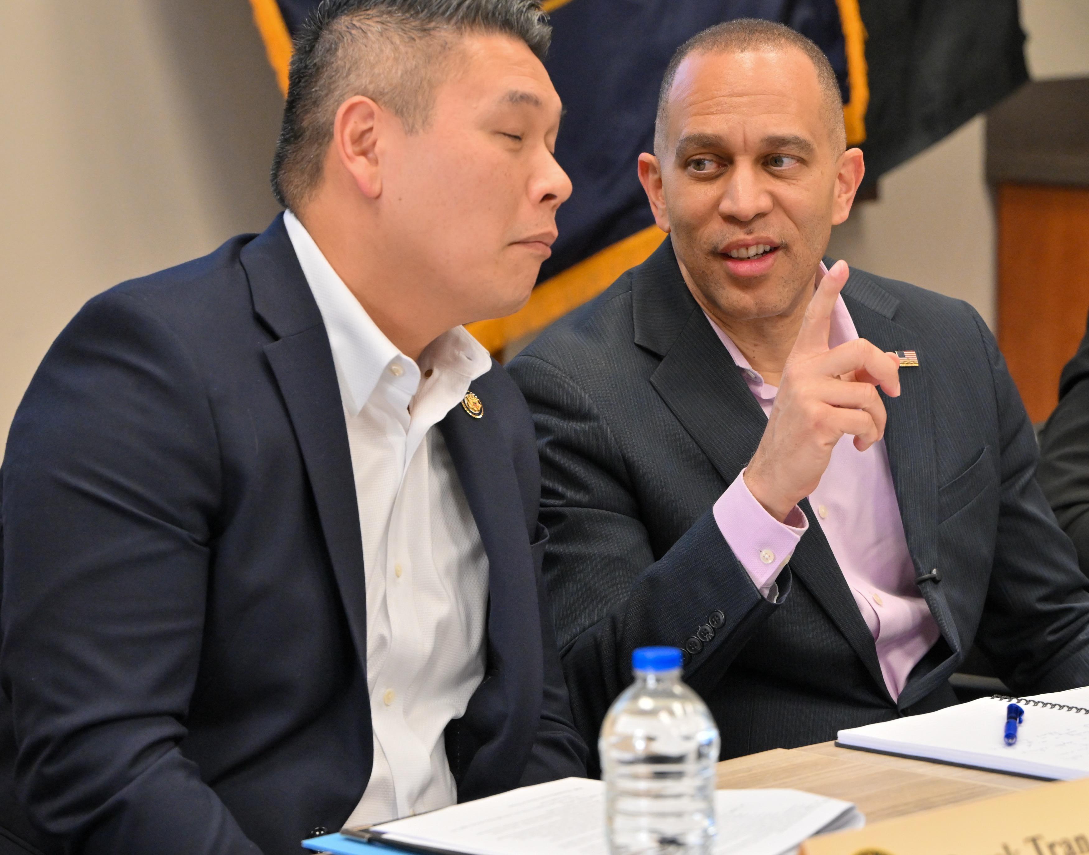 Derek Tran, D-Orange, left, chats with House Minority Leader Hakeem...