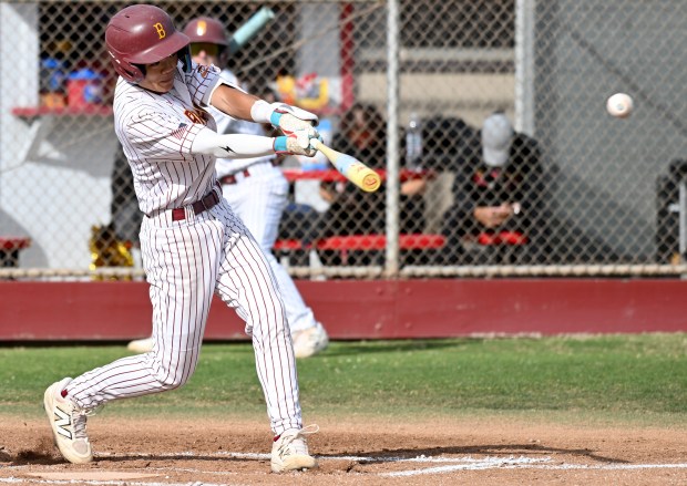 Nicholas Thiem hits for Wilson against Cabrillo during opening day of Moore League play on Friday March 13, 2026. (Photo by Axel Koester, Contributing Photographer)