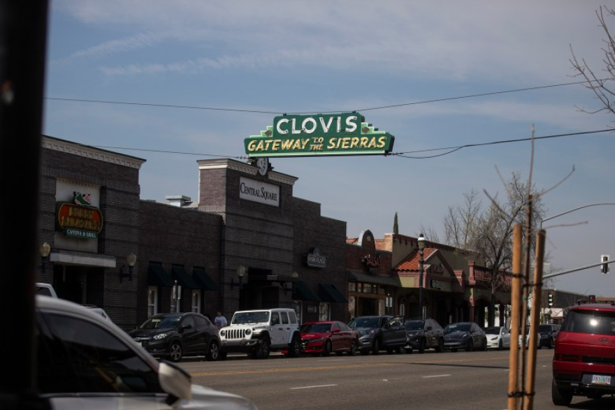 The town sign hanging over Clovis Avenue in Old Town Clovis on Feb. 28, 2026.