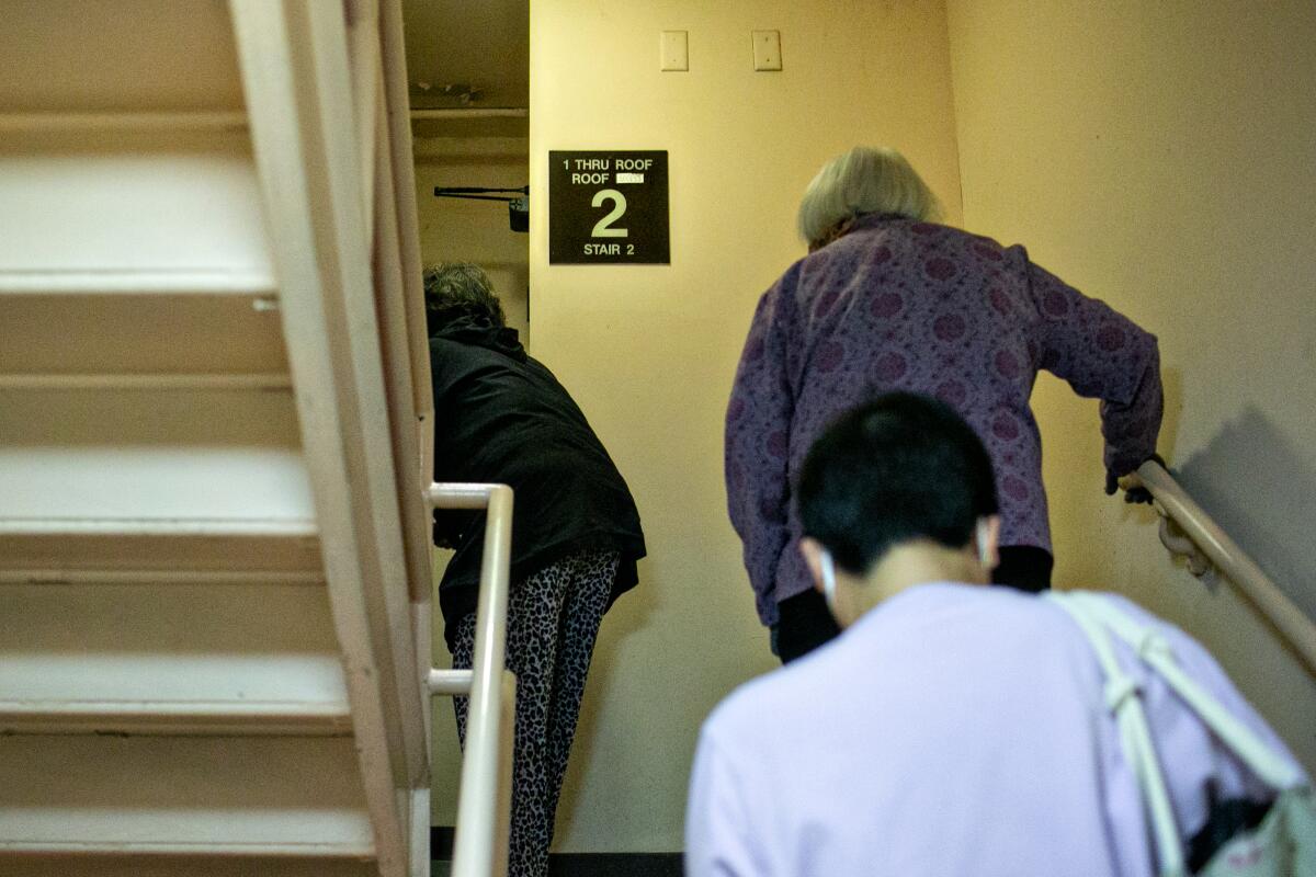 People climbing a flight of stairs