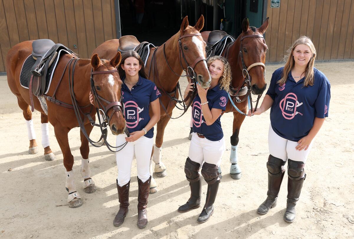 Josie Geiler Allen, Leigh Bertea and Penny Steffens from left, pose with their horses at the Orange County Polo Club.