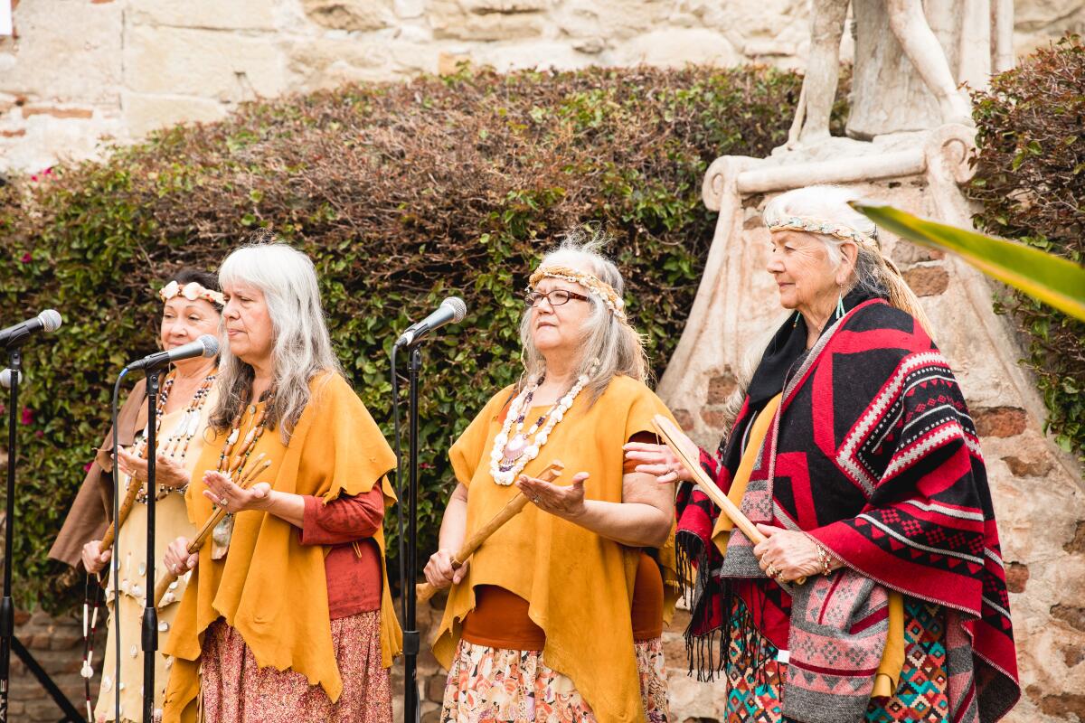 A Native American demonstration at Mission San Juan Capistrano.