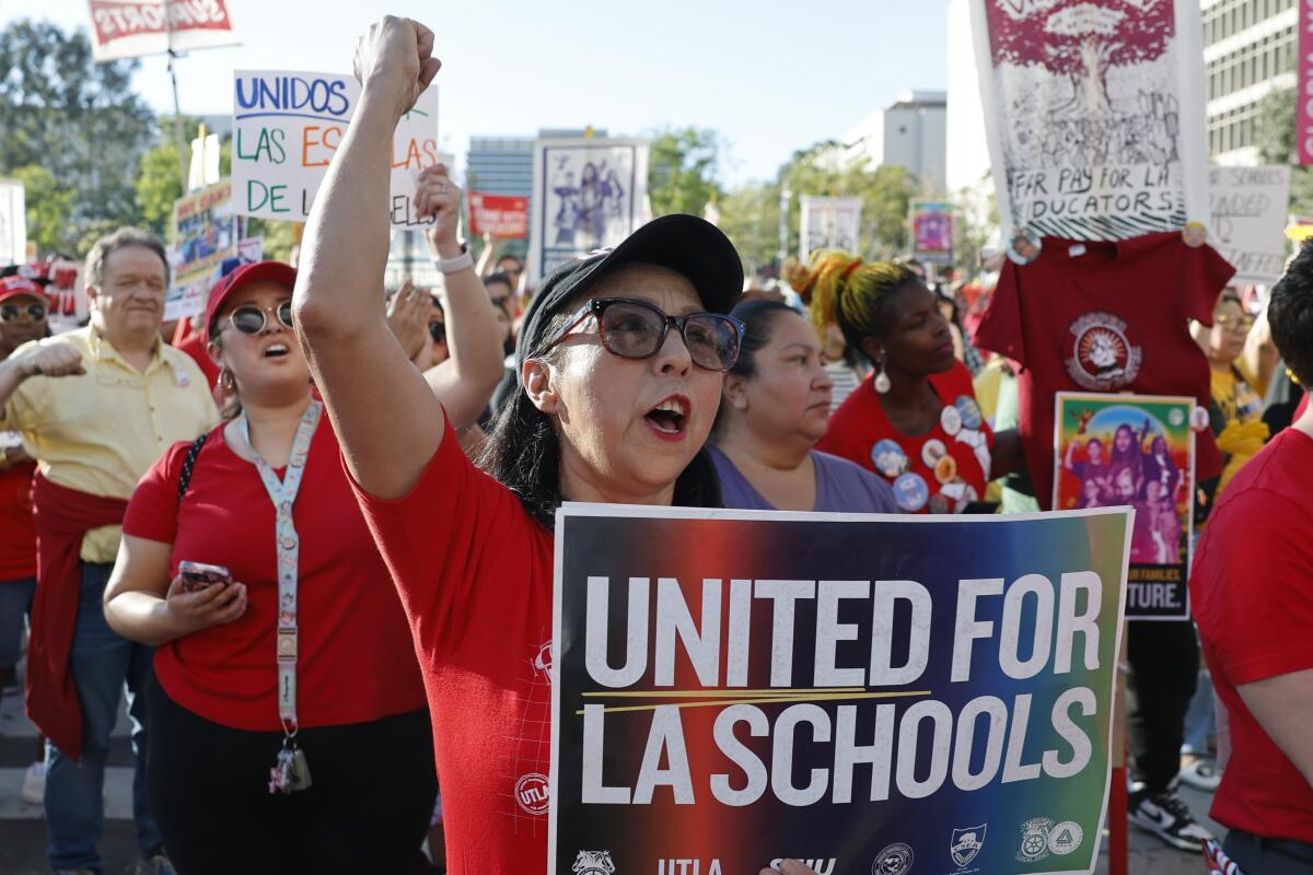 teachers, union members, attend a rally