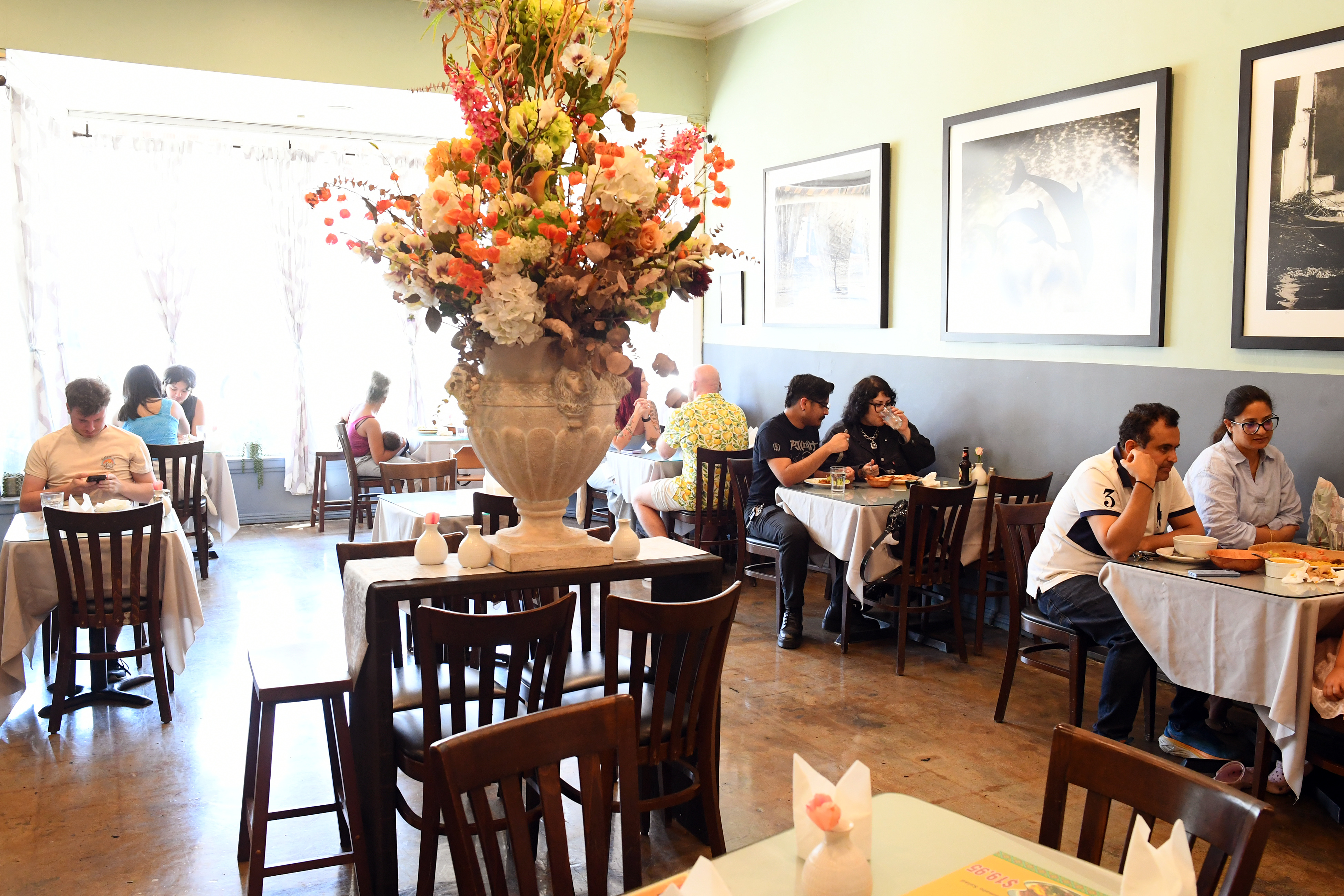 Patrons enjoy plant-based dishes at the all-you-can-eat buffet at Rahel...