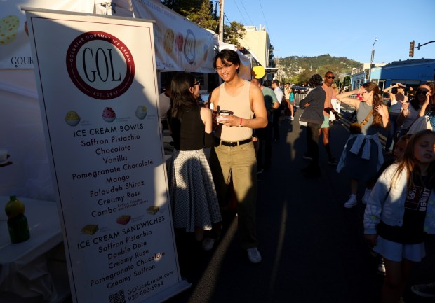 People sample Persian ice cream during the Persian New Year Festival on Durant Avenue in Berkeley, Calif., on Tuesday, March 17, 2026. (Jane Tyska/Bay Area News Group)
