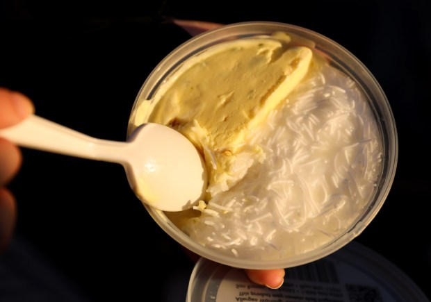 People sample Persian ice cream during the Persian New Year Festival on Durant Avenue in Berkeley, Calif., on Tuesday, March 17, 2026. (Jane Tyska/Bay Area News Group)