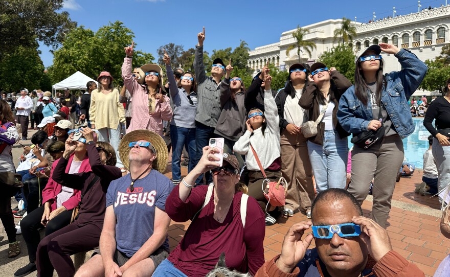 Hundreds of spectators gathered outside the Fleet Science Center in Balboa Park to view Monday's partial solar eclipse. According to NASA, San Diego County experienced the moon cover about 60 to 65 percent of the sun at the eclipse's peak, depending on location, San Diego, Calif., April 8, 2024