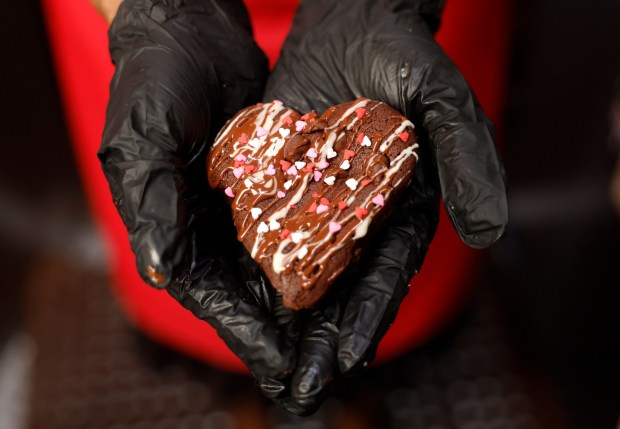 Andrea Lacy, owner and baker at Luv's Brownies, holds a brownie in her food truck in San Jose, Calif., on Monday, March 2, 2026. (Nhat V. Meyer/Bay Area News Group)