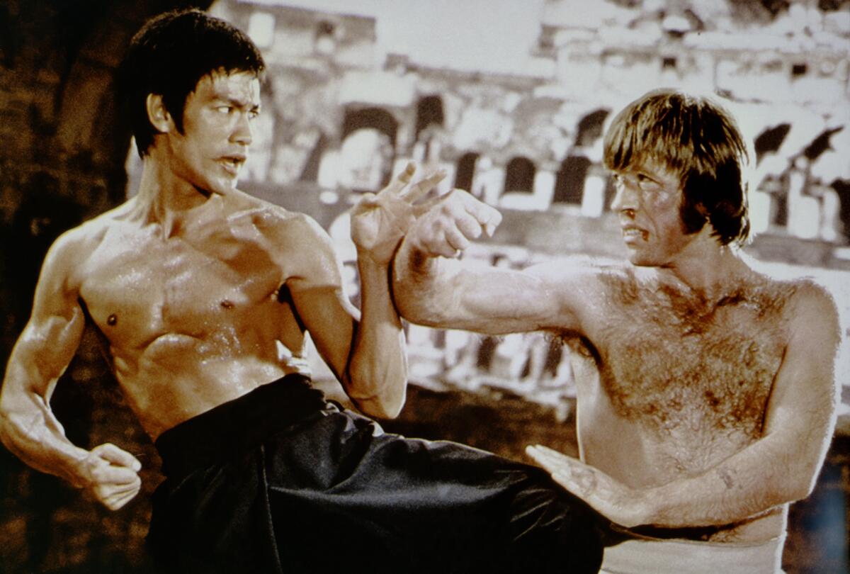 American martial artist Chuck Norris with Chinese American martial artist, actor, director and screenwriter Bruce Lee