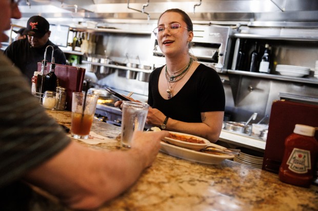On the last day of the Nvidia GTC 2026 conference at the San Jose McEnery Convention Center, Cassi Begnaud, a server at Original Joe's, works at the restaurant in San Jose, Calif., on Thursday, March 19, 2026. (Dai Sugano/Bay Area News Group)