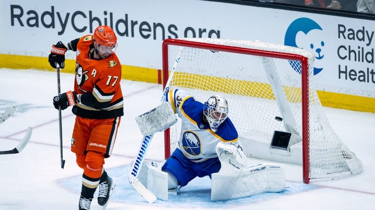 Anaheim Ducks defenseman Jackson LaCombe (not shown) scores against Buffalo...