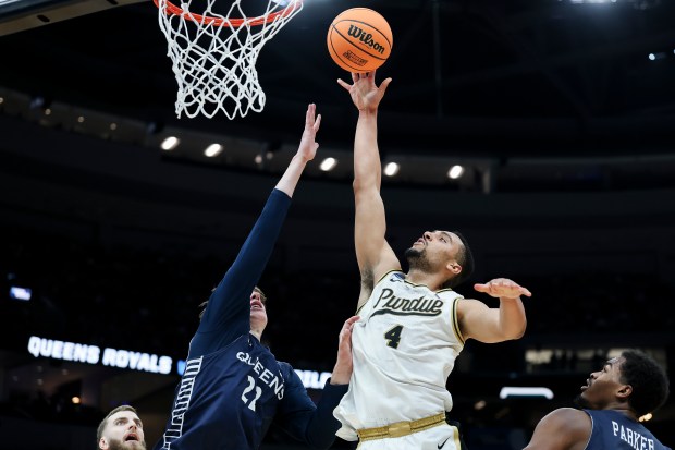 Trey Kaufman-Renn #4 of the Purdue Boilermakers attempts a layup against Carson Schwieger #22 of the Queens University of Charlotte Royals during the first half in the first round of the 2026 NCAA Men's Basketball Tournament at Enterprise Center on March 20, 2026 in St Louis, Missouri. (Photo by Jamie Squire/Getty Images)