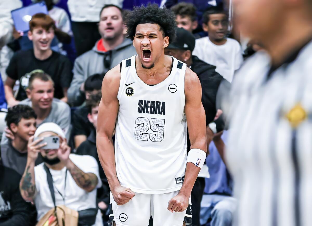 Maxi Adams roars after turning in a 26-point performance in Sierra Canyon's 63-57 win over Harvard-Westlake.