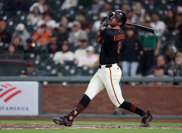 San Francisco Giants' Bryce Eldridge #8 watches the flight of his three-run home run in the eighth inning of their MLB game against the Sultanes de Monterrey at Oracle Park in San Francisco, Calif., on Monday, March 23, 2026. (Jane Tyska/Bay Area News Group)