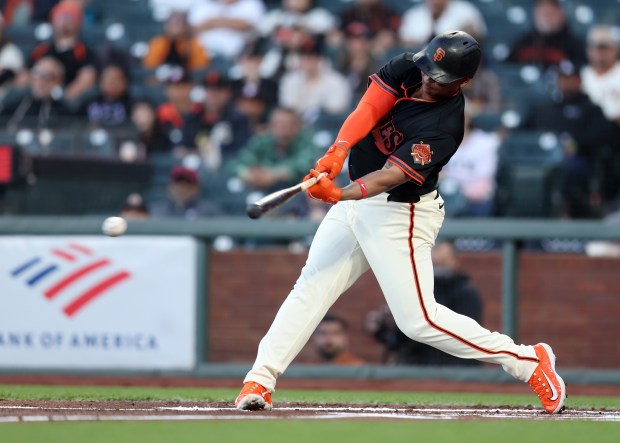 San Francisco Giants designated hitter Rafael Devers #16 hits a single off Sultanes de Monterrey starting pitcher Stephen Tarpley #16 in the first inning of their MLB game at Oracle Park in San Francisco, Calif., on Monday, March 23, 2026. (Jane Tyska/Bay Area News Group)