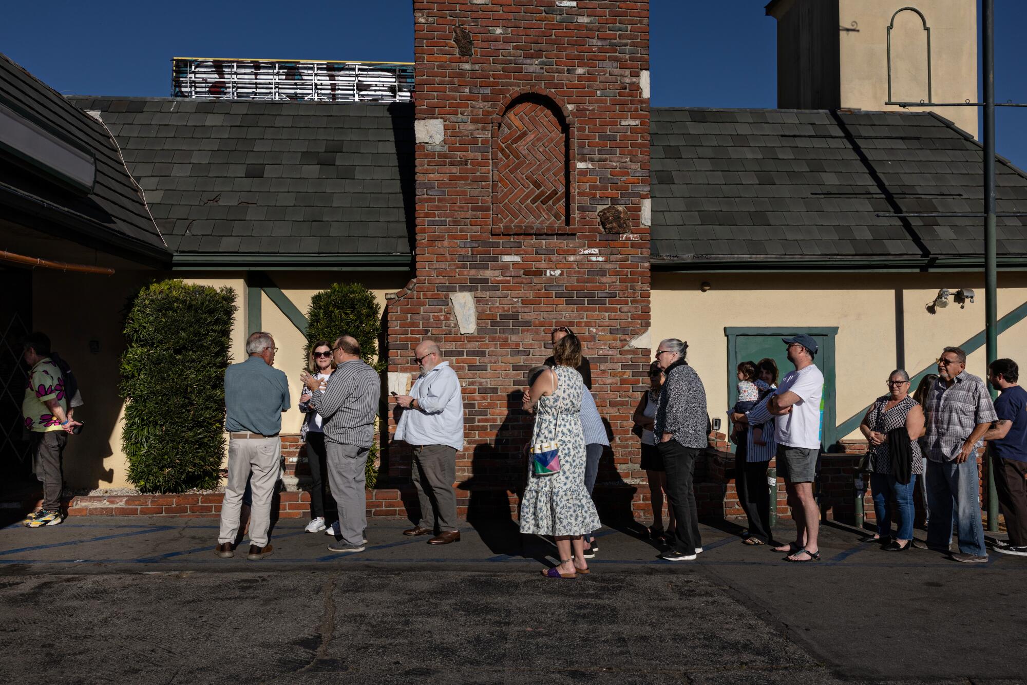 Guests line up to eat at Taix before it closes at the end of the month.