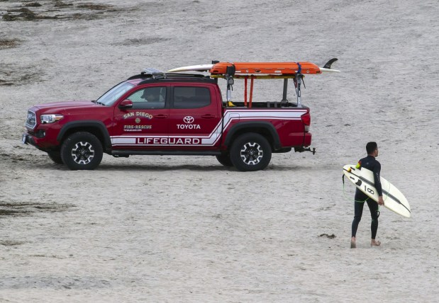 Red-and-white Toyota lifeguard trucks soon will be phased out in favor of Hyundai vehicles. (John Gibbins / U-T file)