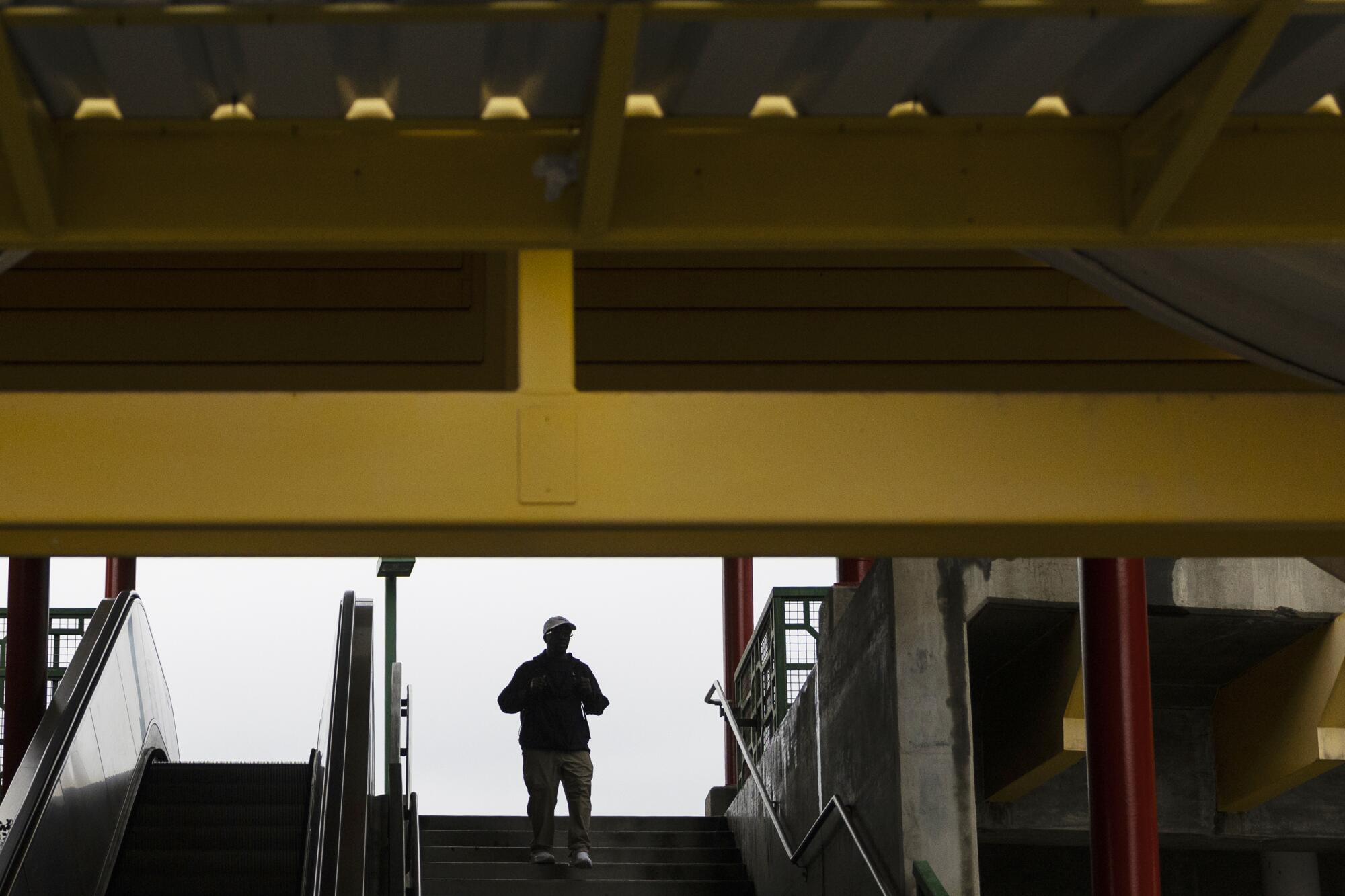A passenger exits the Chinatown Metro station in January.